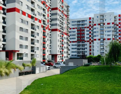 New Build Development of Flats with red and grey facade