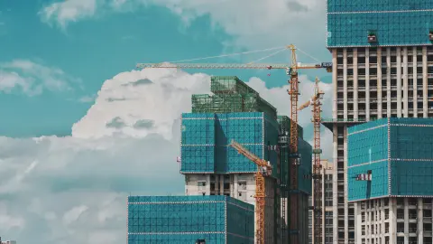 Development of high-rise Buildings under construction with several cranes