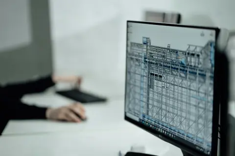 Building design of a new development on a desktop monitor