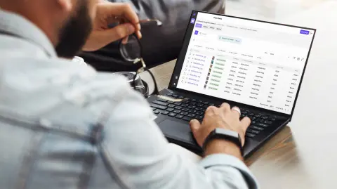 Open laptop displaying construction photographic evidence records on Zutec Cloud